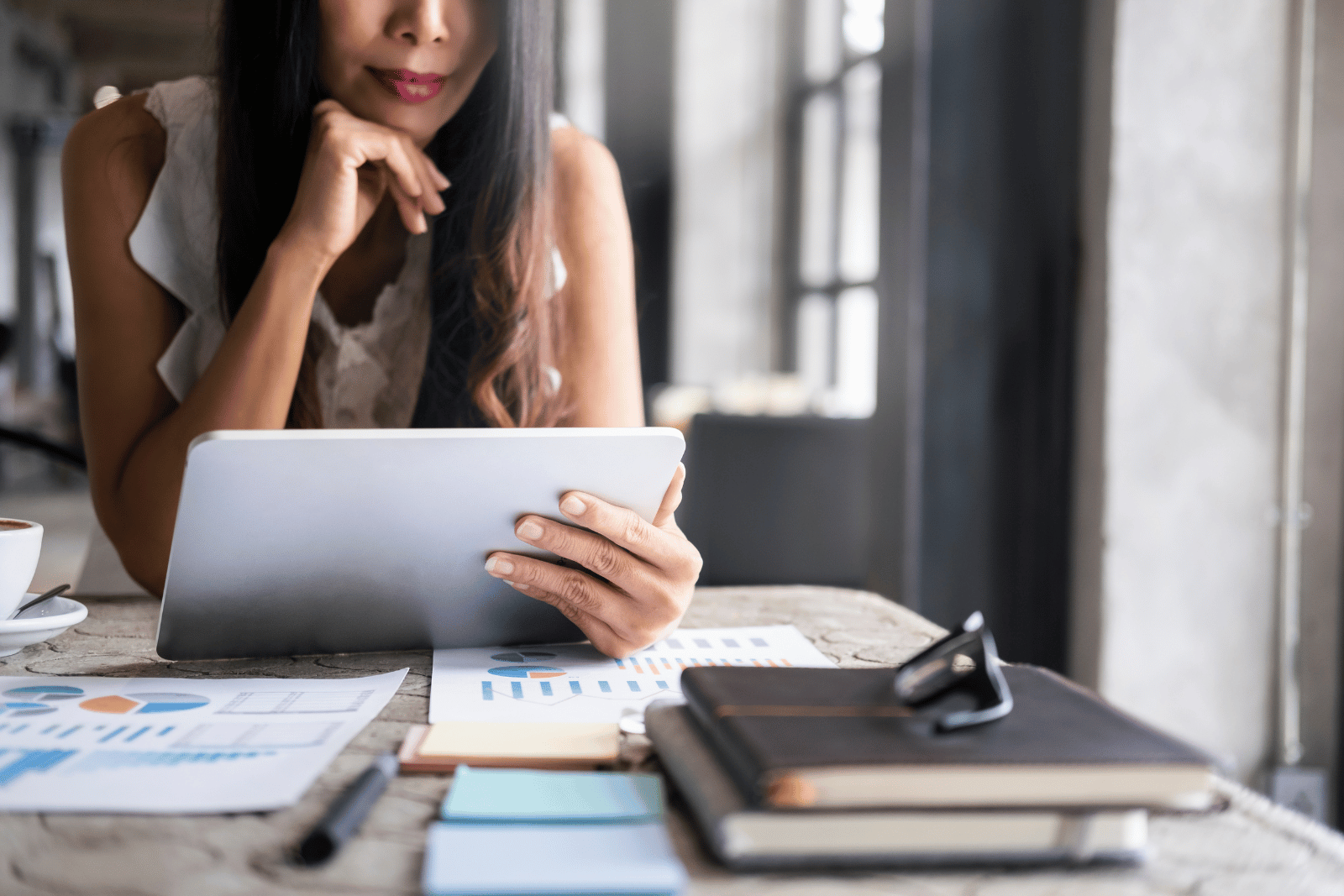 Woman considering which marketing metrics to track